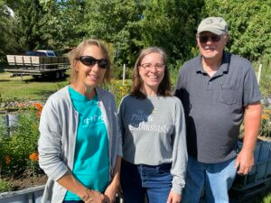 Prairie Enthusiasts Executive Director Debra Behrens with two volunteers.