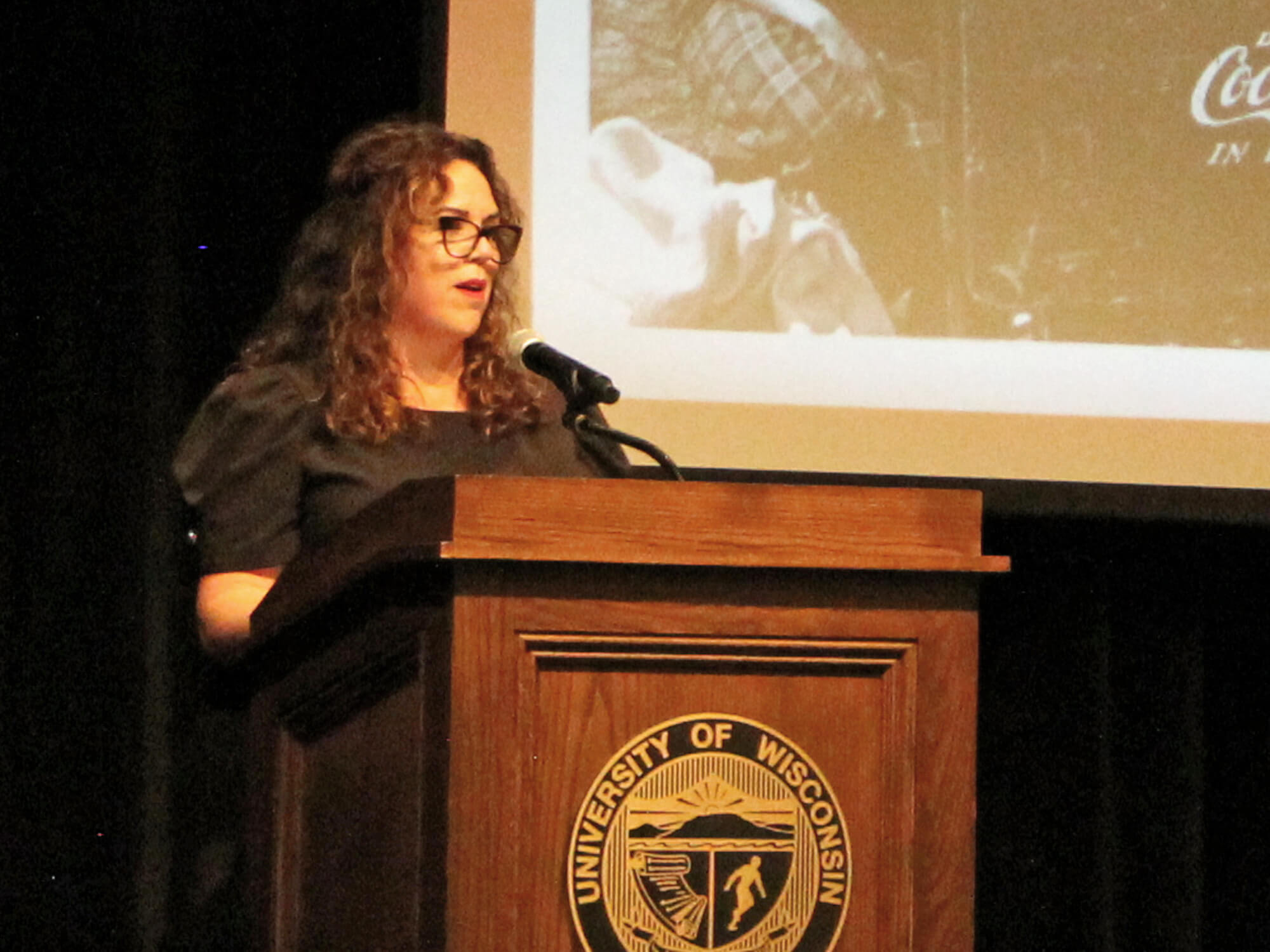 YWCA La Crosse Executive Director Laurie Cooper Stoll speaks at the "Tribute to Outstanding Women" event.