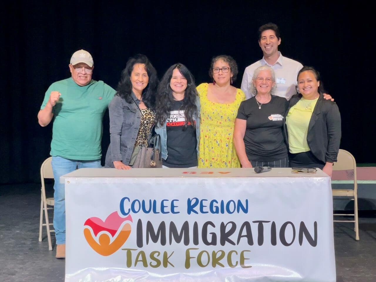 Representatives from CRITF, Voces de la Frontera and The America Friends Foundation pose for photo at an immigration event.