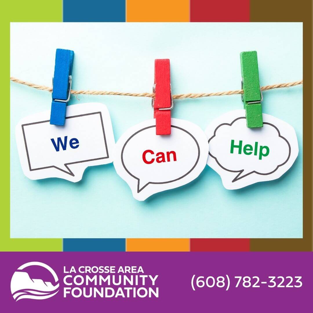 Words "we," "can," and "help" pinned to clothesline to indicate free coaching and resources for La Crosse County nonprofits.